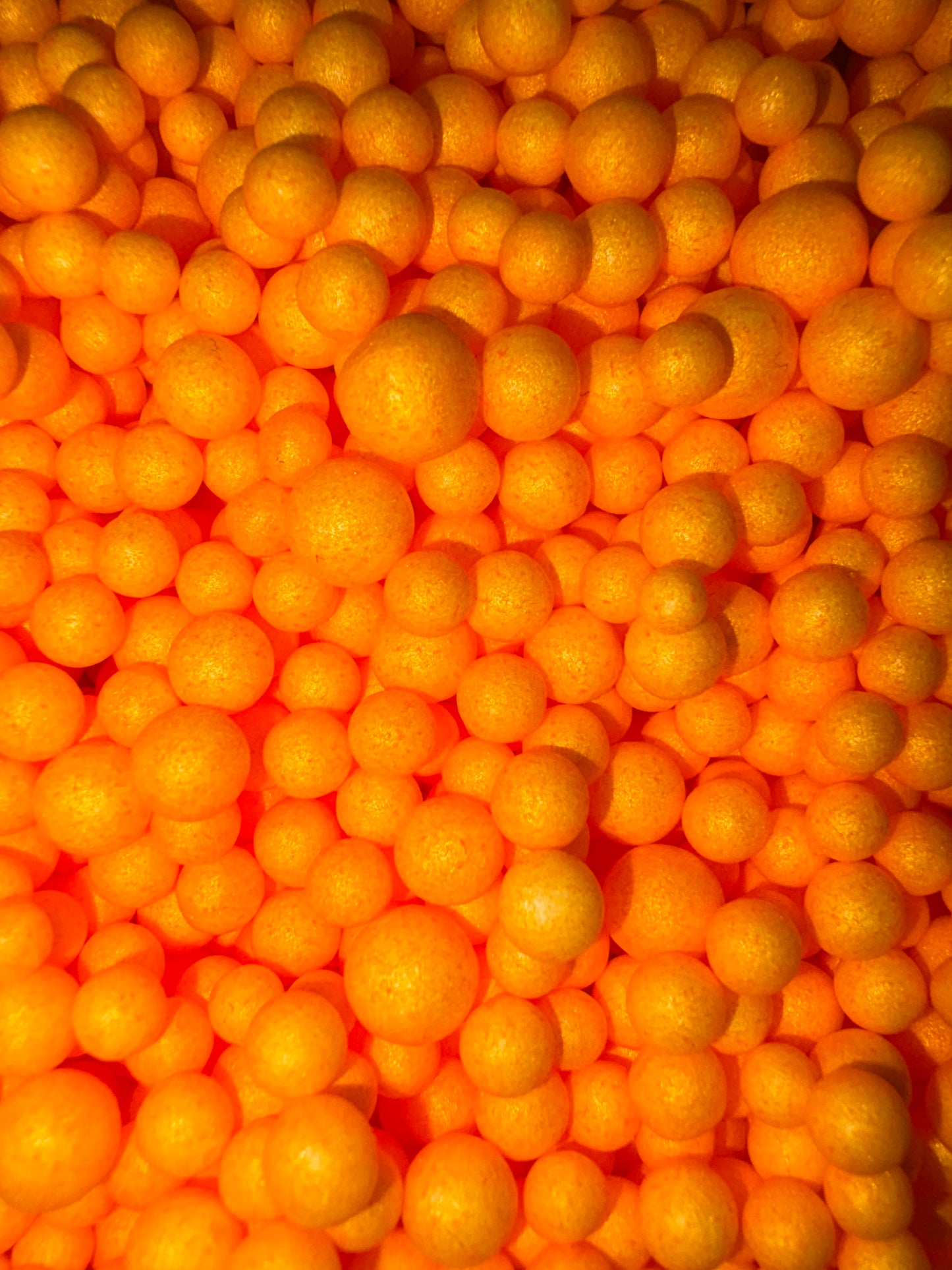 Orange polystyrene balls